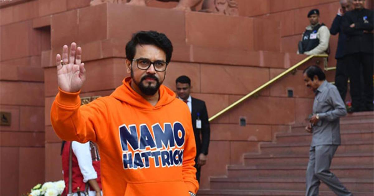 Union Minister Anurag Thakur wears 'Namo Hattrick' saffron hoodie to parliament